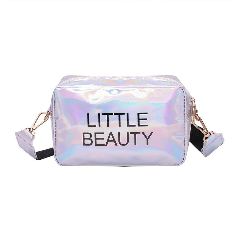Holographic, waterproof cosmetic bag with "LITTLE BEAUTY" print, zipper closure, and removable shoulder strap.