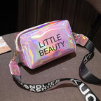 Holographic, waterproof cosmetic bag with "LITTLE BEAUTY" text, zipper closure, and black branded shoulder strap.