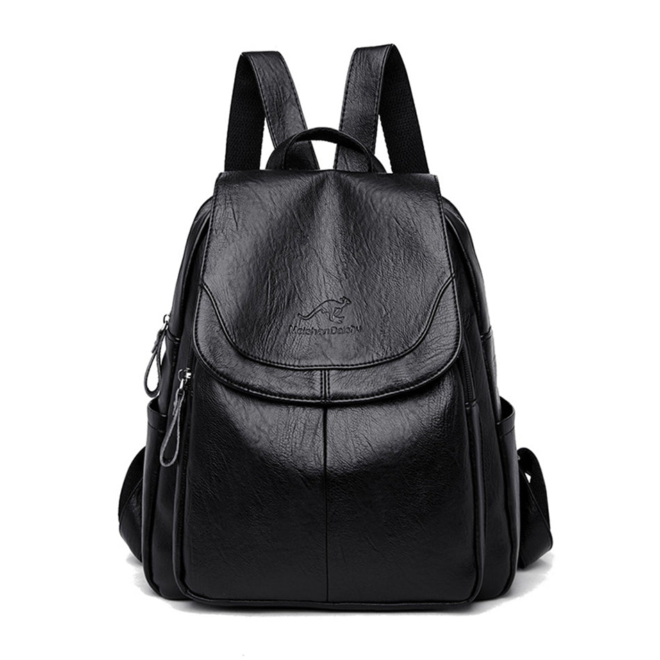 Black soft leather backpack with a flap closure, kangaroo logo, and adjustable straps. Stylish, casual, large capacity.