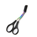 Iridescent metal eyebrow trimming scissors with black plastic handles and an integrated comb on a white background.