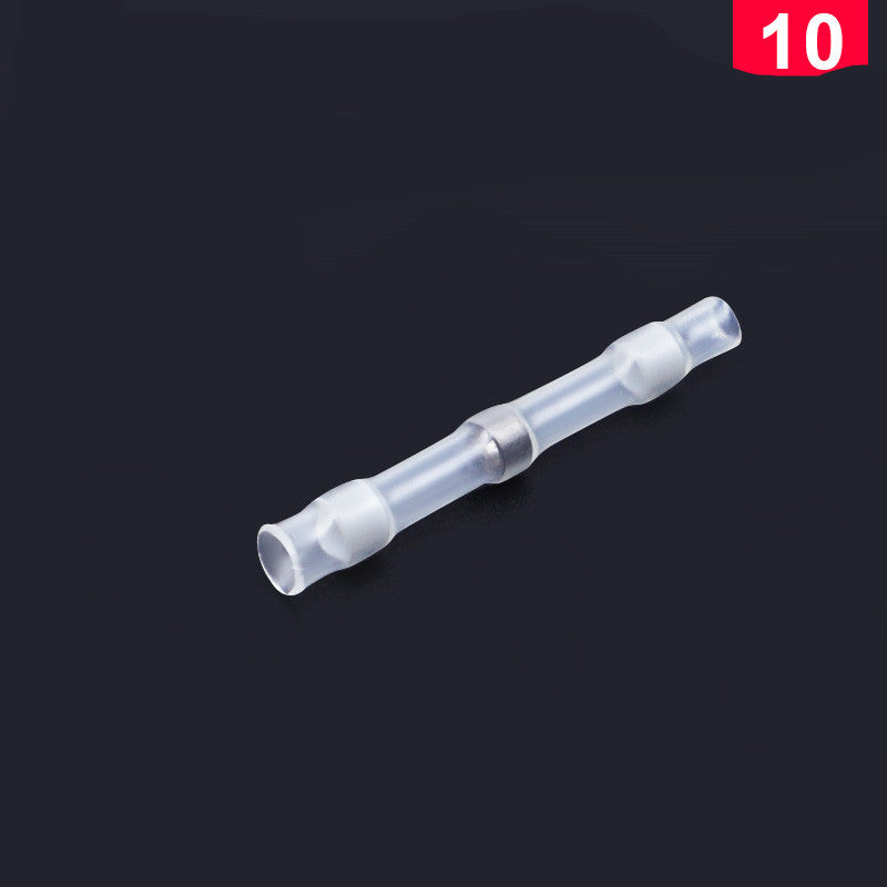 Clear, heat-shrinkable waterproof wire connector with a centered metal solder ring on a black background.