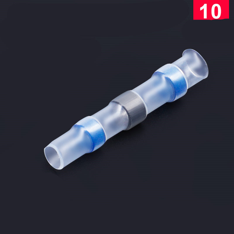 Clear heat shrink solder terminal with blue bands on a black background. Used for waterproof wire connections.