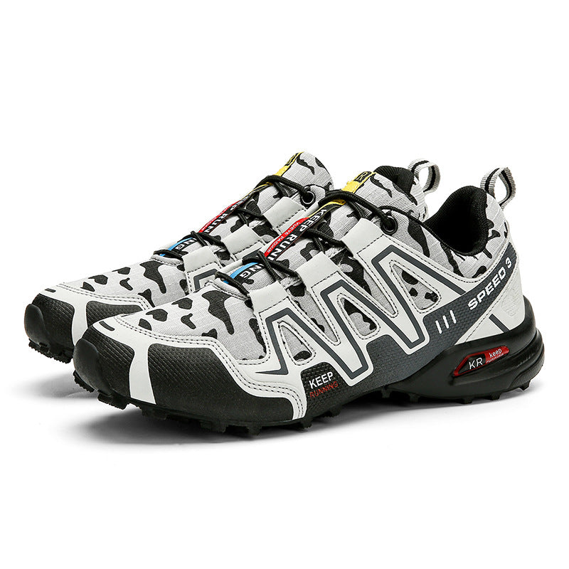 Men’s black and white cow-print hiking sneakers with durable rubber soles, lace-up closure, and "Speed 3" branding.
