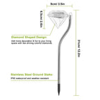 Diamond-shaped solar garden light with a stainless steel stake, showing dimensions and waterproof features.