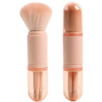 Beige 4-in-1 retractable makeup brush tool with soft bristles and a portable, cylindrical plastic case.