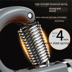 Close-up of a 4mm carbon steel spring on a grey, heavy-duty hand grip exerciser for strength training.