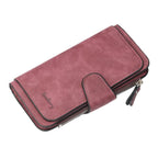 Maroon faux leather women's wallet with a snap-button closure, zipper detail, and embossed Baellerry logo.