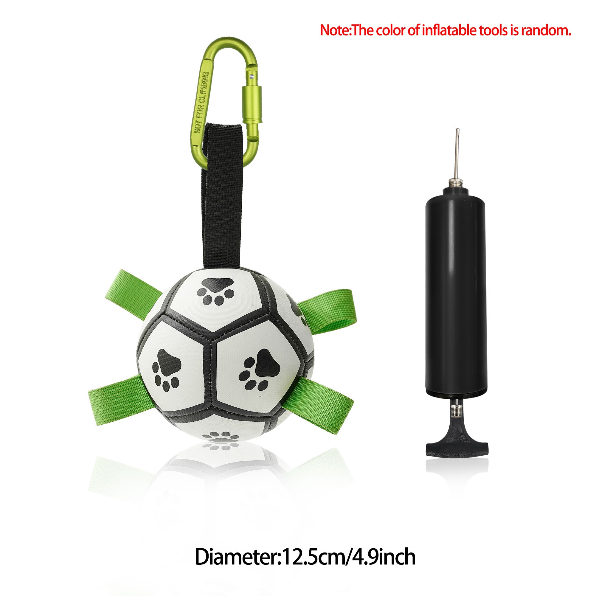Black-and-white paw-print dog soccer ball with green nylon tug straps, a metal carabiner, and a black air pump.