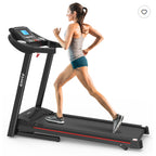 A woman jogs on a black foldable electric treadmill with an LCD screen and red accents against a white background.