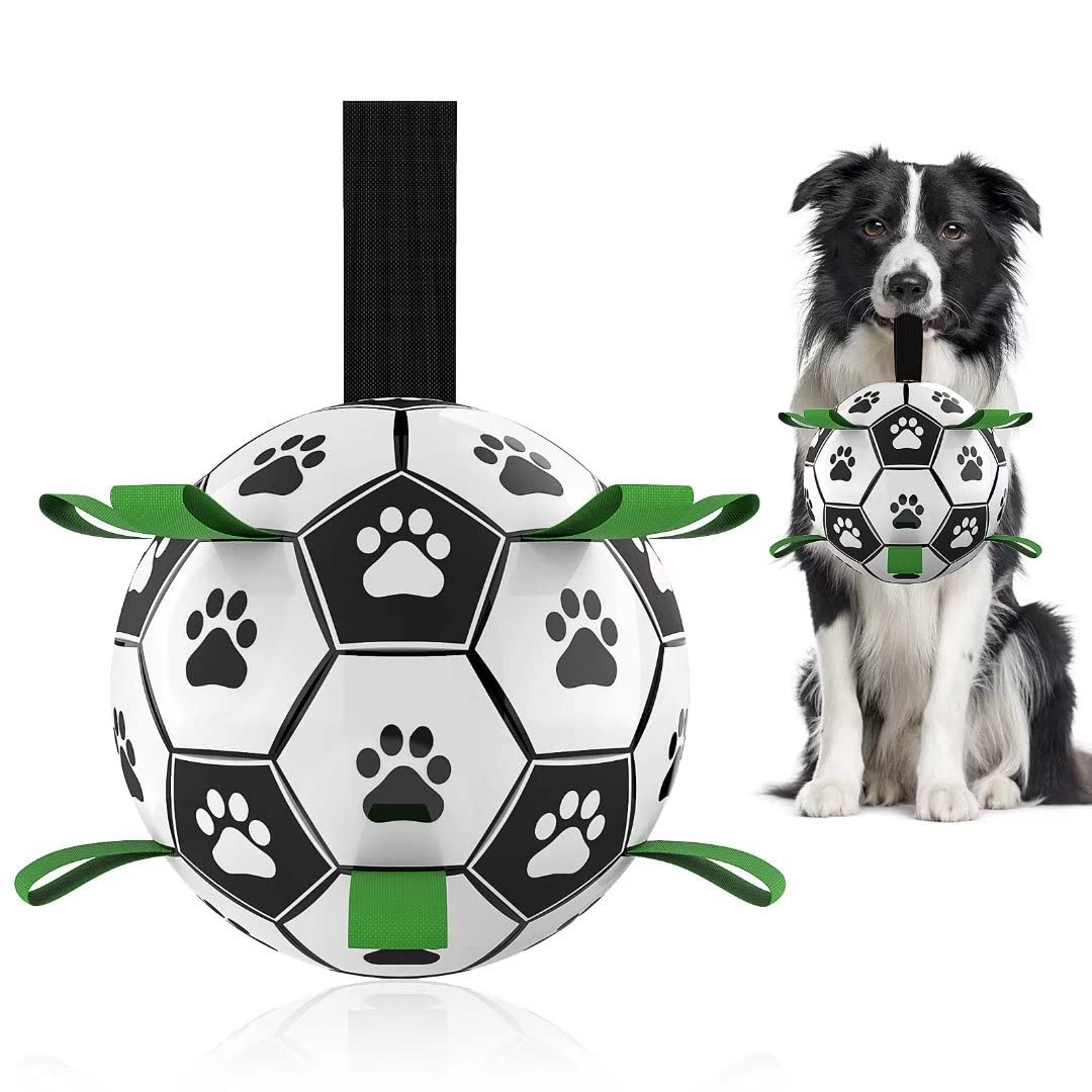 Black and white soccer ball toy for dogs with paw prints, green nylon grab tabs, and a border collie.