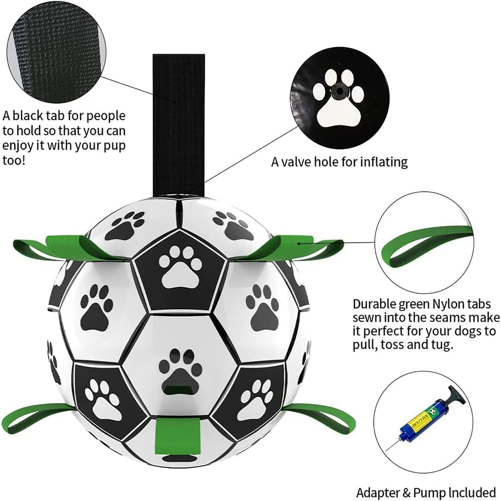 Black-and-white paw-print dog soccer ball with green nylon tug tabs, an inflation valve, and an included pump.