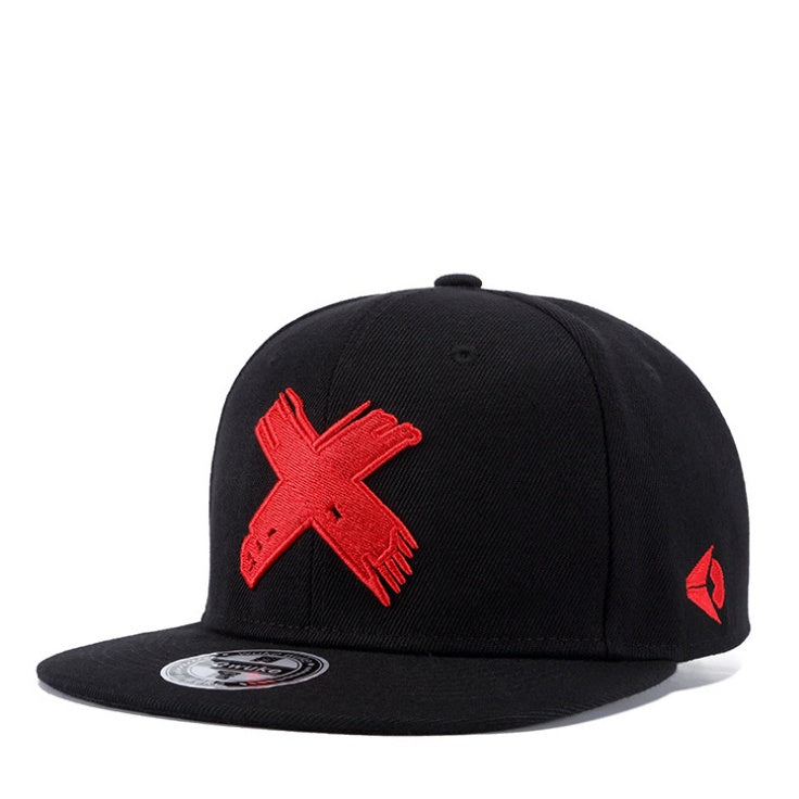 Black snapback hat with a textured red "X" embroidered on the front and a small red logo on the side.
