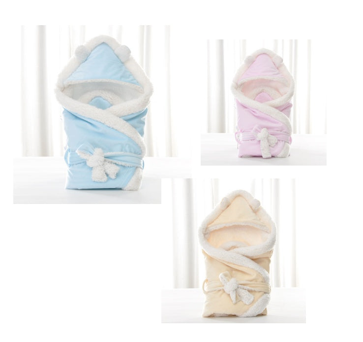 Blue, pink, and cream newborn baby swaddle blankets with white fleece lining, hood, and tie-front bow closure.