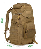Tan tactical 60L hiking backpack with molle webbing, mesh front pocket, buckled straps, and dimensions marked.