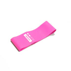 A bright pink, flat rubber resistance band labeled "MEDIUM" with three heart icons, isolated on a white background.