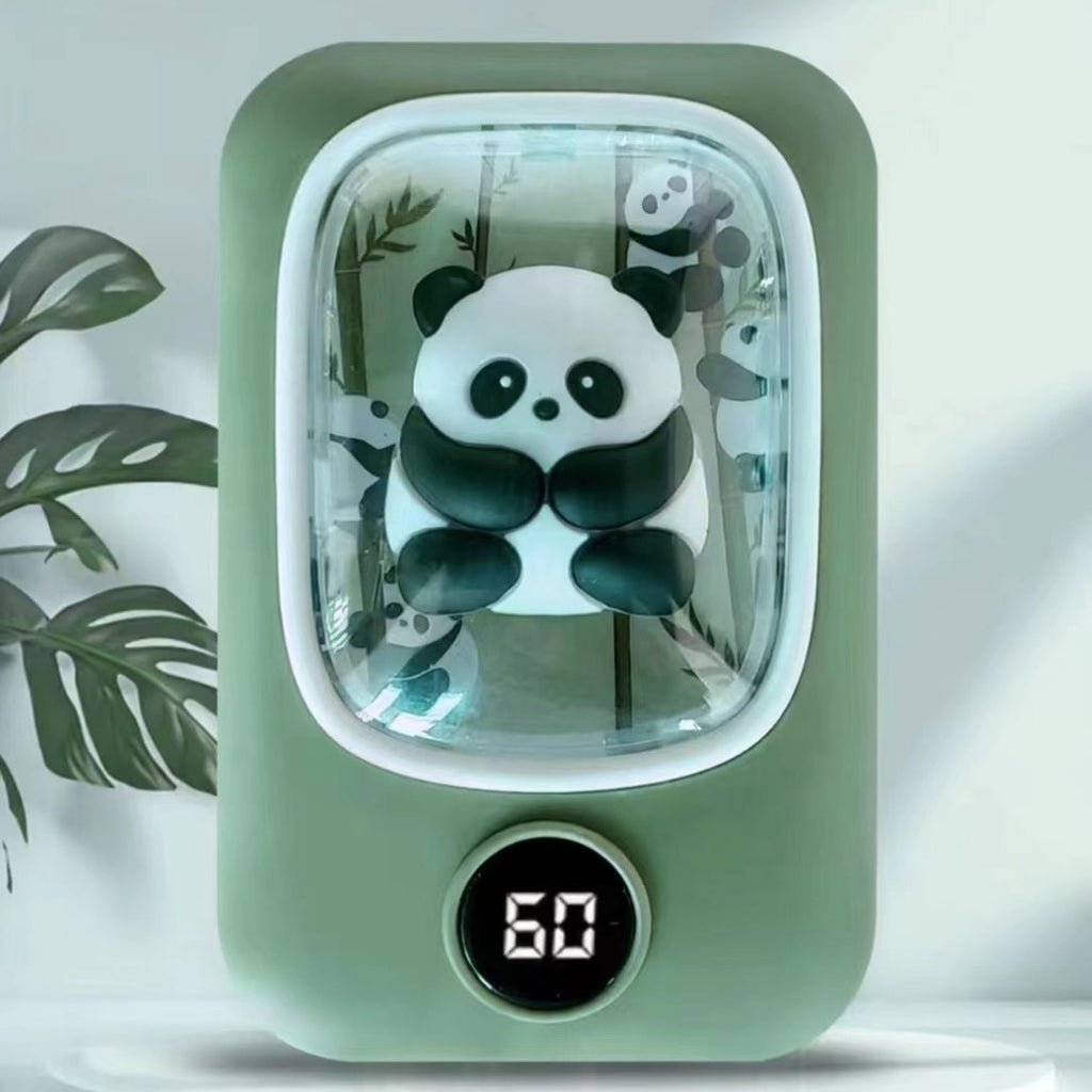 Olive green rechargeable hand warmer featuring a clear display window with a 3D panda figure and a digital temp readout.