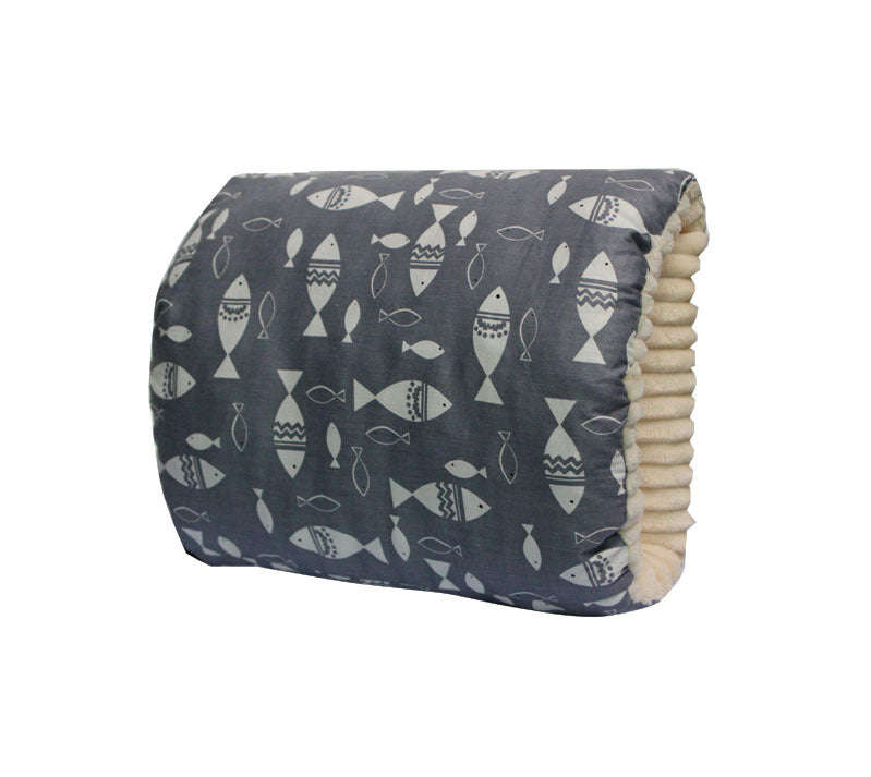 Grey baby nursing arm pillow with white fish pattern and cream-colored textured interior lining.