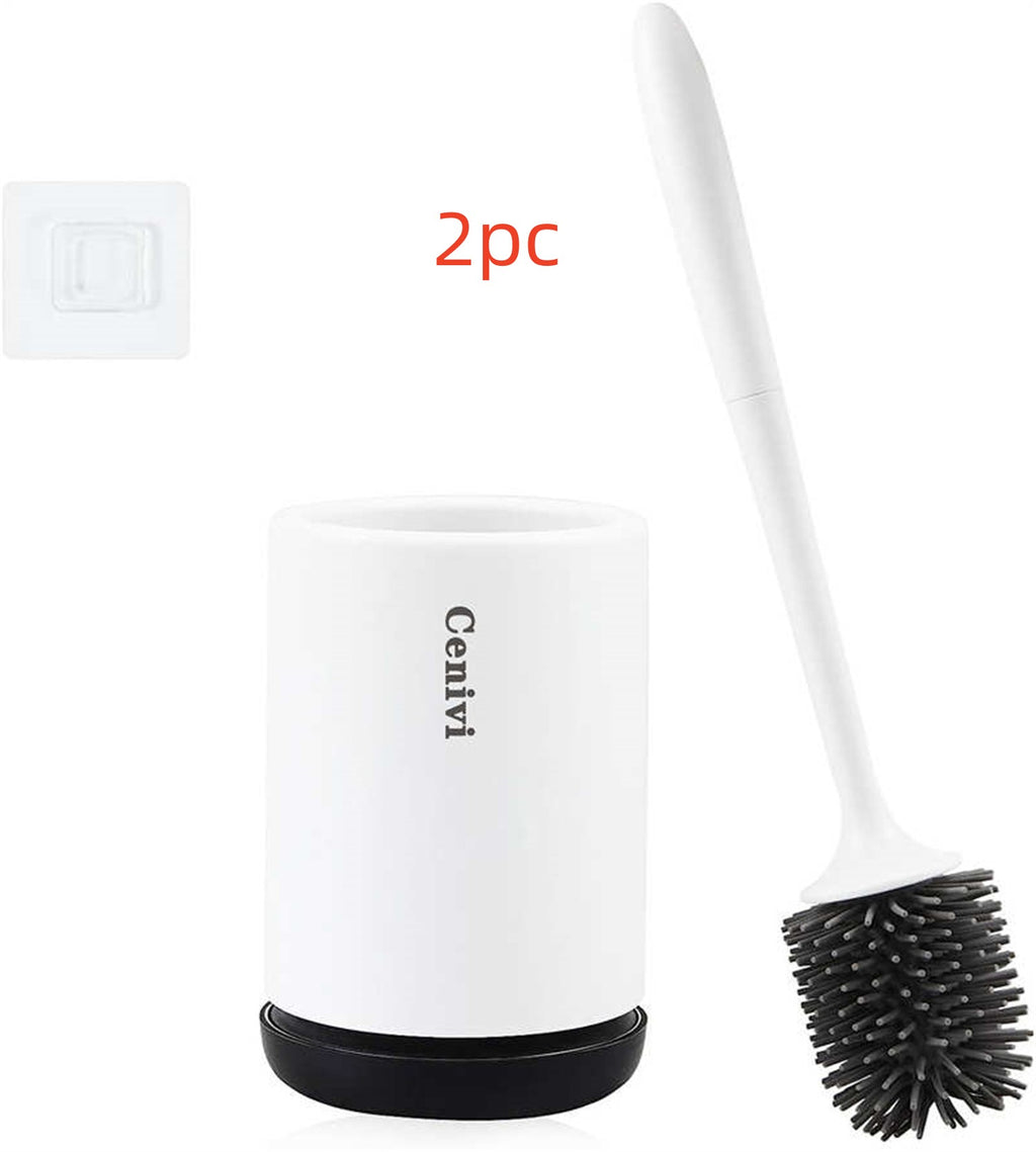 White toilet brush set with grey silicone bristles, white holder with black base, and a wall-mount adhesive hook.