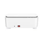 White rectangular ultrasonic cleaning machine for glasses with a red power switch on a minimalist plastic base.