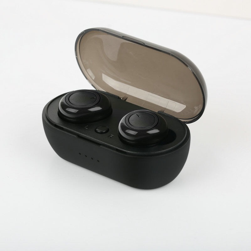 Black, round wireless in-ear headphones in an open, matte black charging case with a translucent, smoky lid.