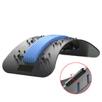Black lumbar traction device with blue center padding, acupressure nodes, and an adjustable manual crank mechanism.