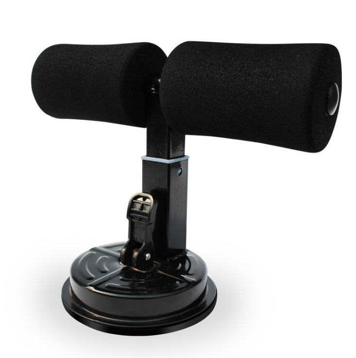 Black sit-up bar with foam-padded ankle supports and a circular suction cup base for floor mounting.