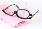 Digitaldistribution375 makeup reading glasses with black oval frames, leopard print temples, and a soft pink case.