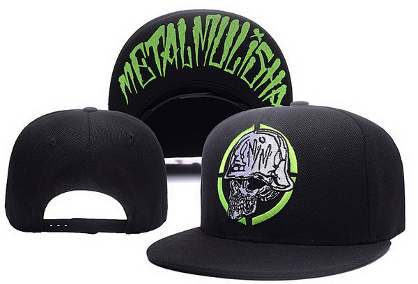 Black hip-hop snapback hat with skull graphic, green crosshair, and "Metal Mulisha" text on the underside of the brim.