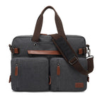 Dark gray canvas multifunctional messenger bag with brown faux leather trim, dual front pockets, and adjustable strap.