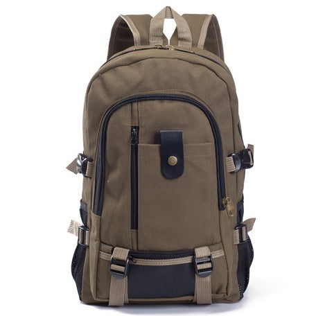 Olive green canvas backpack with black leather accents, side buckles, front zip pocket, and adjustable straps.