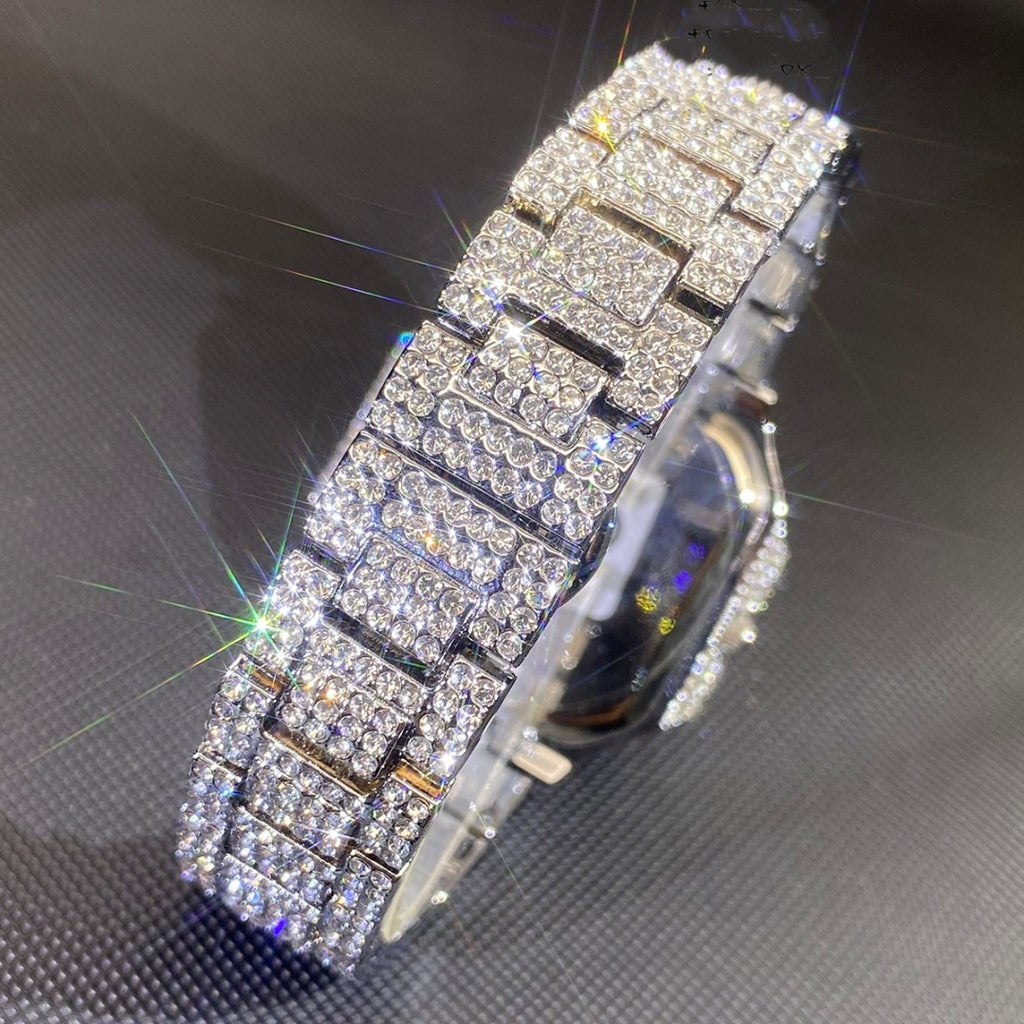 Iced-out men’s hip-hop watch with a square face and full crystal-encrusted silver-tone metal link band.