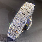 Iced-out men’s hip-hop watch with a square face and full crystal-encrusted silver-tone metal link band.