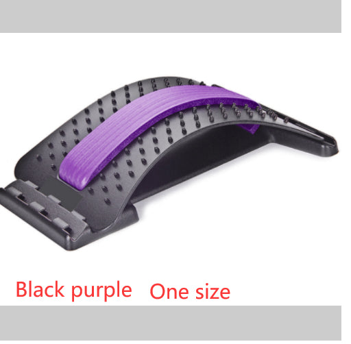 Curved black plastic lumbar support device with a purple cushioned center and massage spikes for back pain relief.