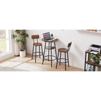 Rustic wood and black metal bistro set with a round table, shelf, and two matching backrest bar stools in a room.