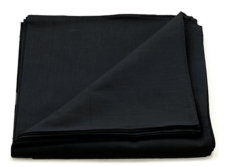 A solid black square cotton scarf folded with one corner lifted, isolated on a white background.