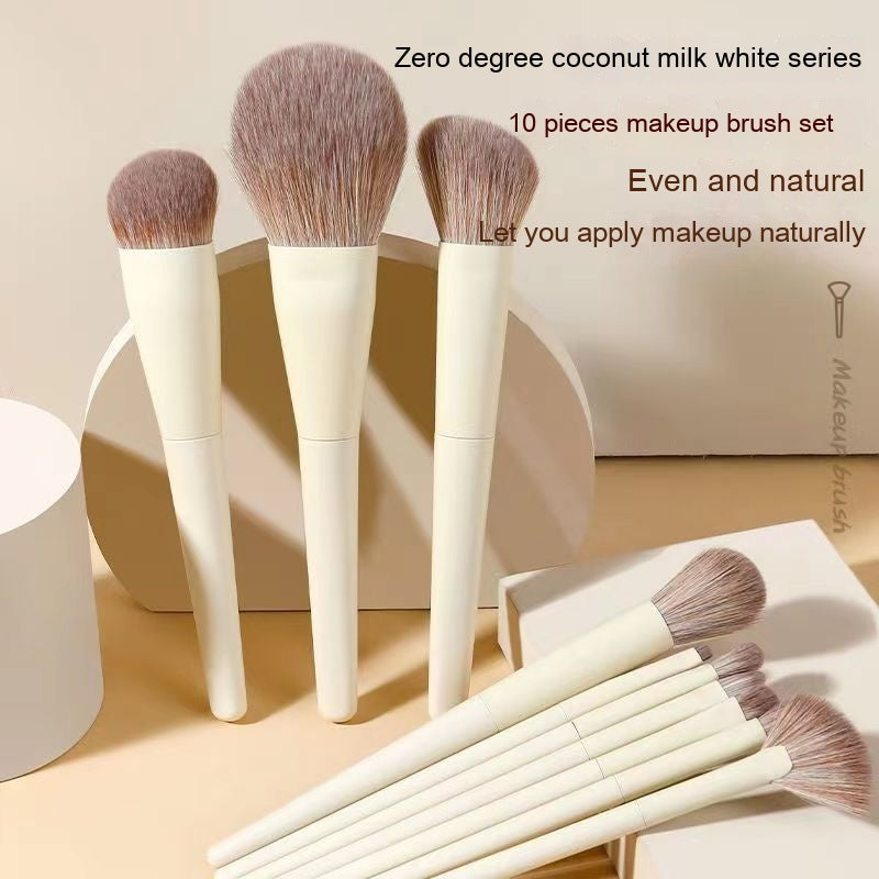 10-piece Zero degree makeup brush set in coconut milk white with soft, light-brown synthetic bristles.