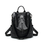 Digitaldistribution375 black soft leather multifunctional backpack with a front vertical zip and adjustable straps.