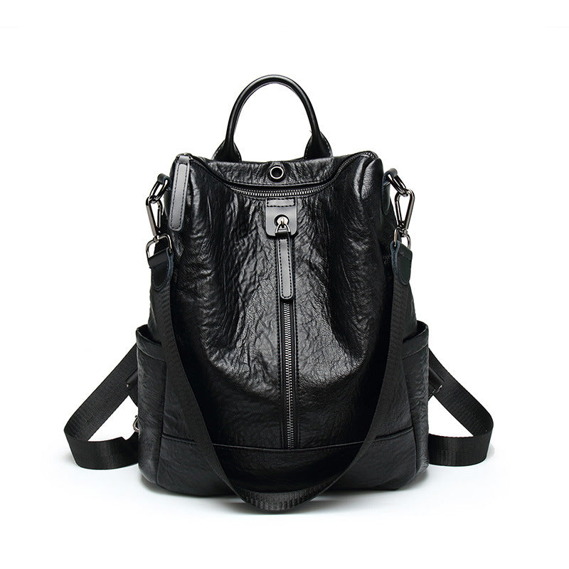 Digitaldistribution375 black soft leather multifunctional backpack with a front vertical zip and adjustable straps.