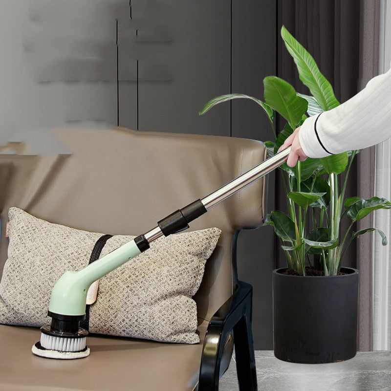 Retractable wireless electric cleaning brush with a light green handle and round white bristle brush head.