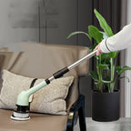 Retractable wireless electric cleaning brush with a light green handle and round white bristle brush head.