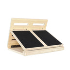 Wooden slant board for exercise, featuring two black anti-slip surfaces and an adjustable angled design.