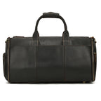 Vintage brown leather duffle bag with sturdy top handles, side zippers, and minimalist design on a white background.