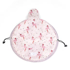 Pink fabric drawstring cosmetic bag with flamingo and flower print, featuring a velcro pocket and black cord closure.