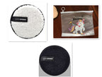 White and black round plush makeup removal puffs with "Clean Sponge" labels, plus a clear unicorn storage pouch.