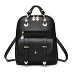 Black PU leather dual-use backpack featuring gold-tone hardware, a front flap pocket, and top carry handles.