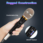 Handheld black dynamic microphone with a metal mesh grille, gold ring, and on/off switch, held in a person's hand.