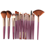 Digitaldistribution375 makeup set: 15 brushes with metallic purple handles, rose gold ferrules, and brown-tipped bristles.