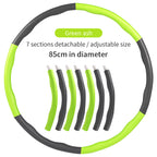 Detachable 85cm green and gray foam-padded fitness hula hoop with seven adjustable, interlocking sections.