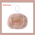 Fluffy beige plush hand warmer with a cute embroidered bear face and a white hanging loop.