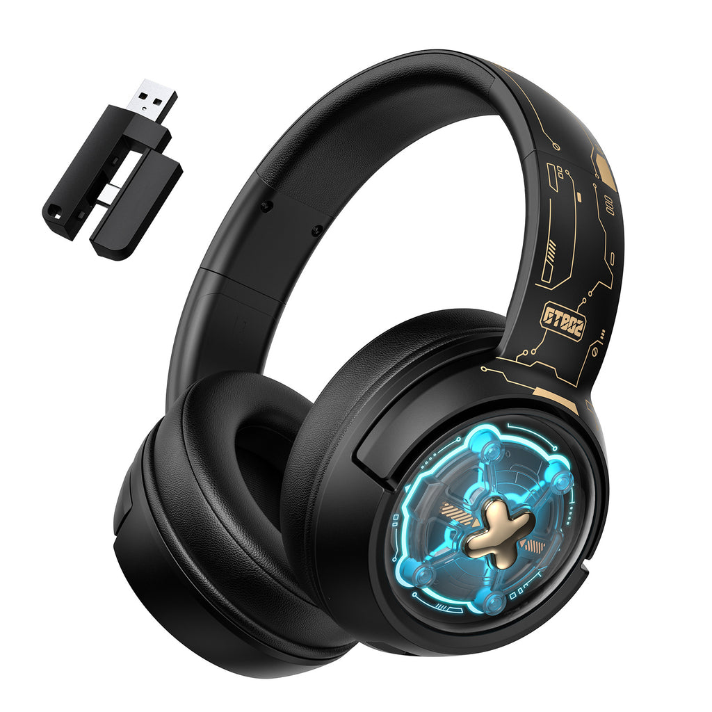 Black over-ear wireless gaming headset with gold tech accents, blue LED accents, and a matching USB-C wireless receiver.